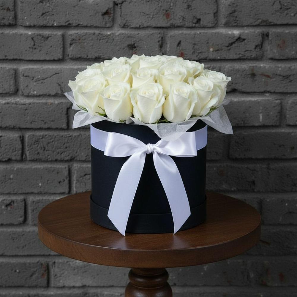 Цветочная композиция из Розы в шляпной коробке в Волгодонске